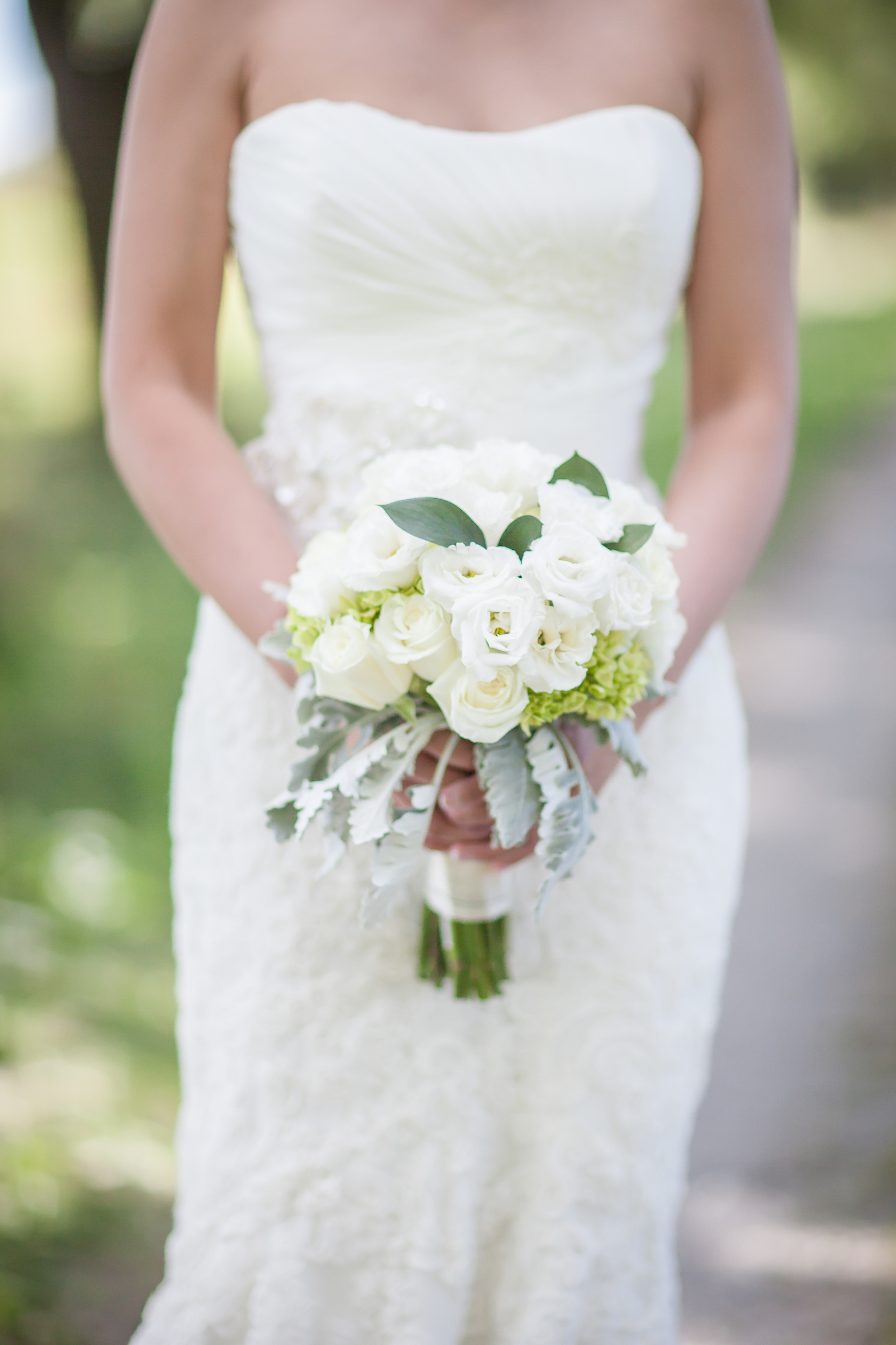 Close up photo of a bride holding her bouquet