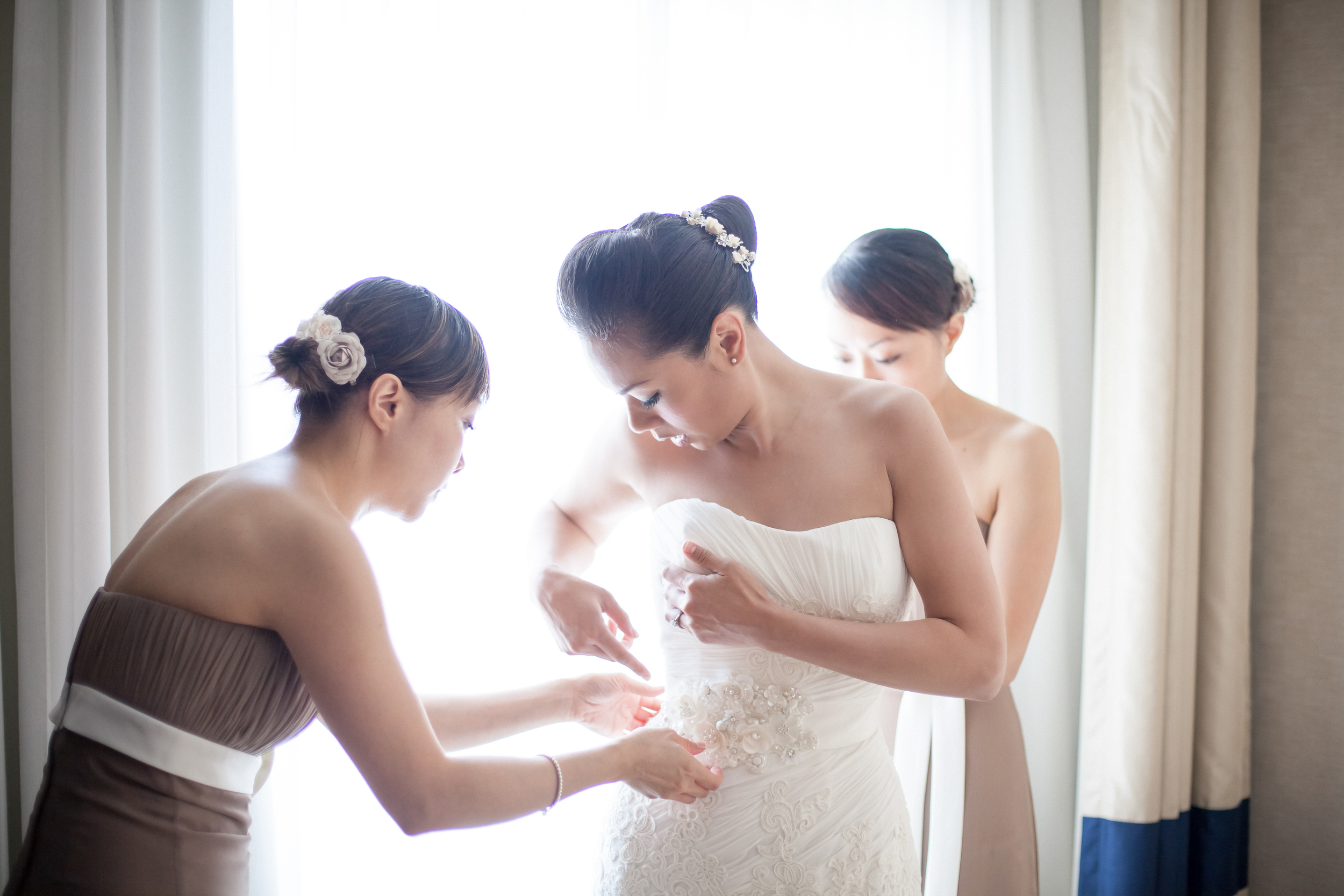 Bride and bridesmaids getting ready in a hotel