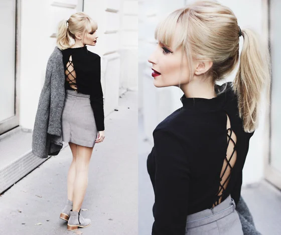Lace up sweater from behind