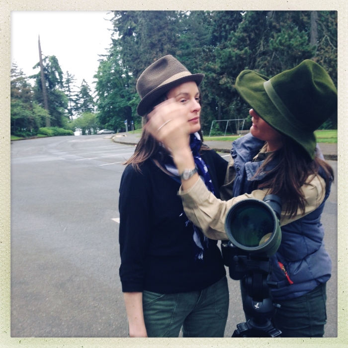 Sis Gilia brushing hair out of my face in front of Jen's scope. Seward Park, Seattle. Beginning a full day of birding at 7:30 a.m.