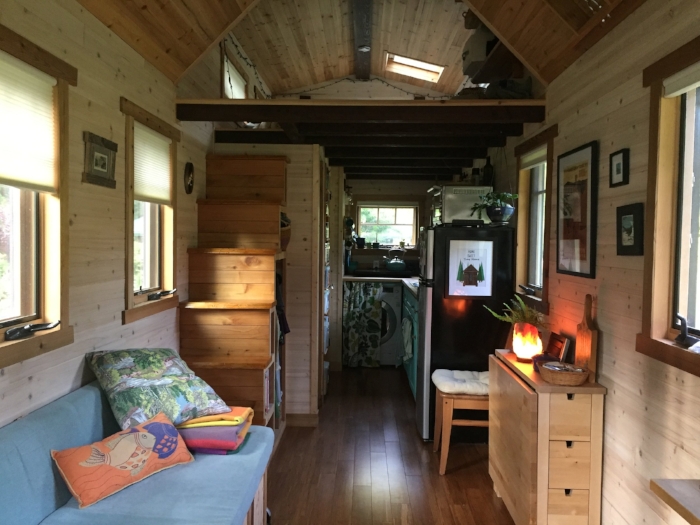 The cozy inside of the tiny house. Mundy's studio area is the counter to the right in the extreme foreground.