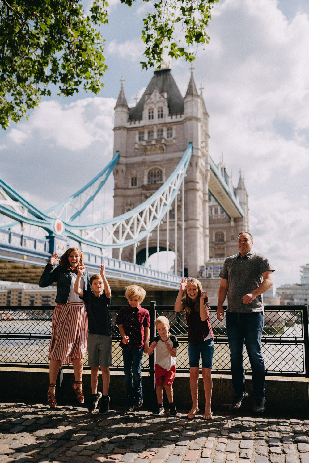 Family portrait photoshoot at Tower Bridge, London