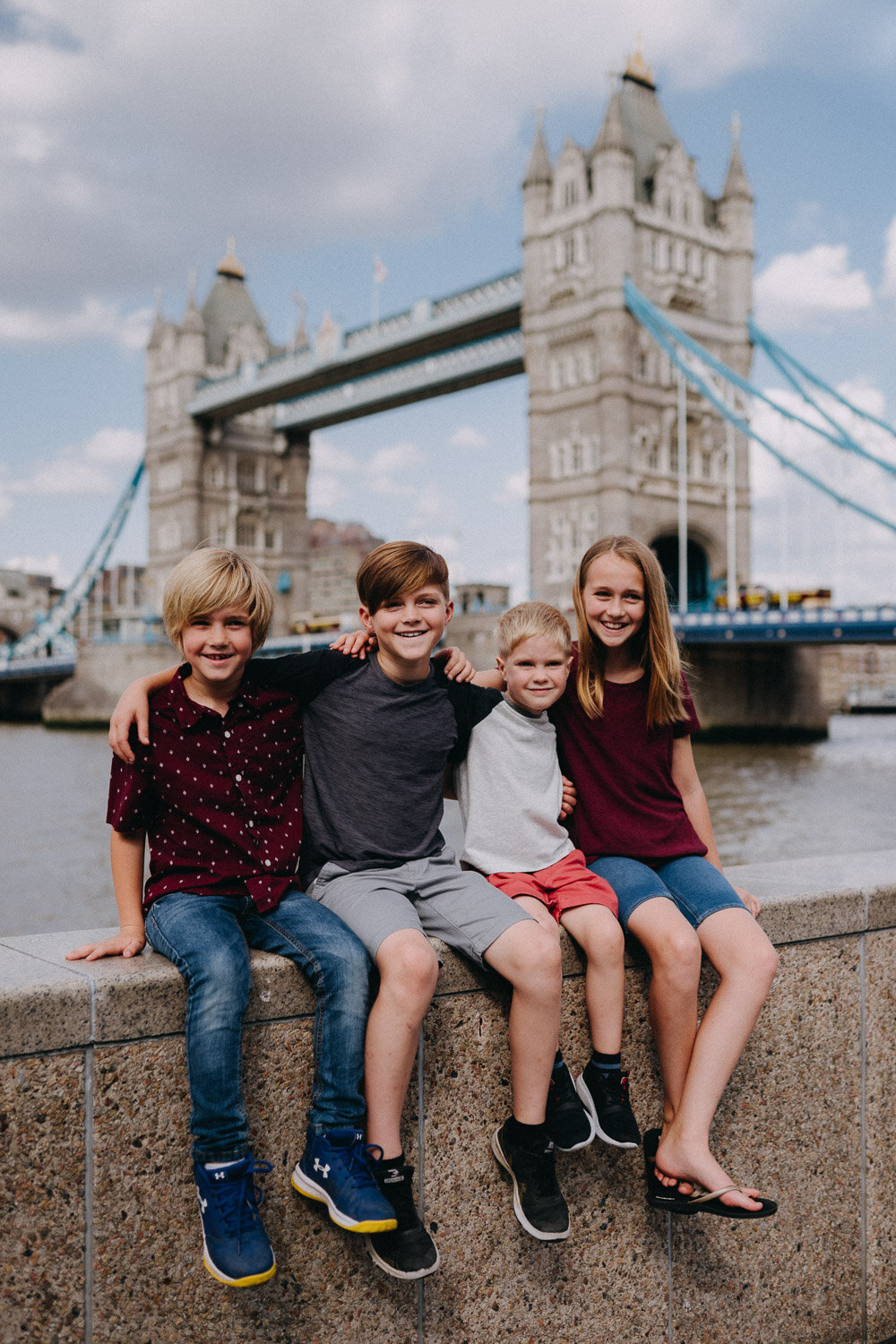 Family portrait photoshoot at Tower Bridge, London
