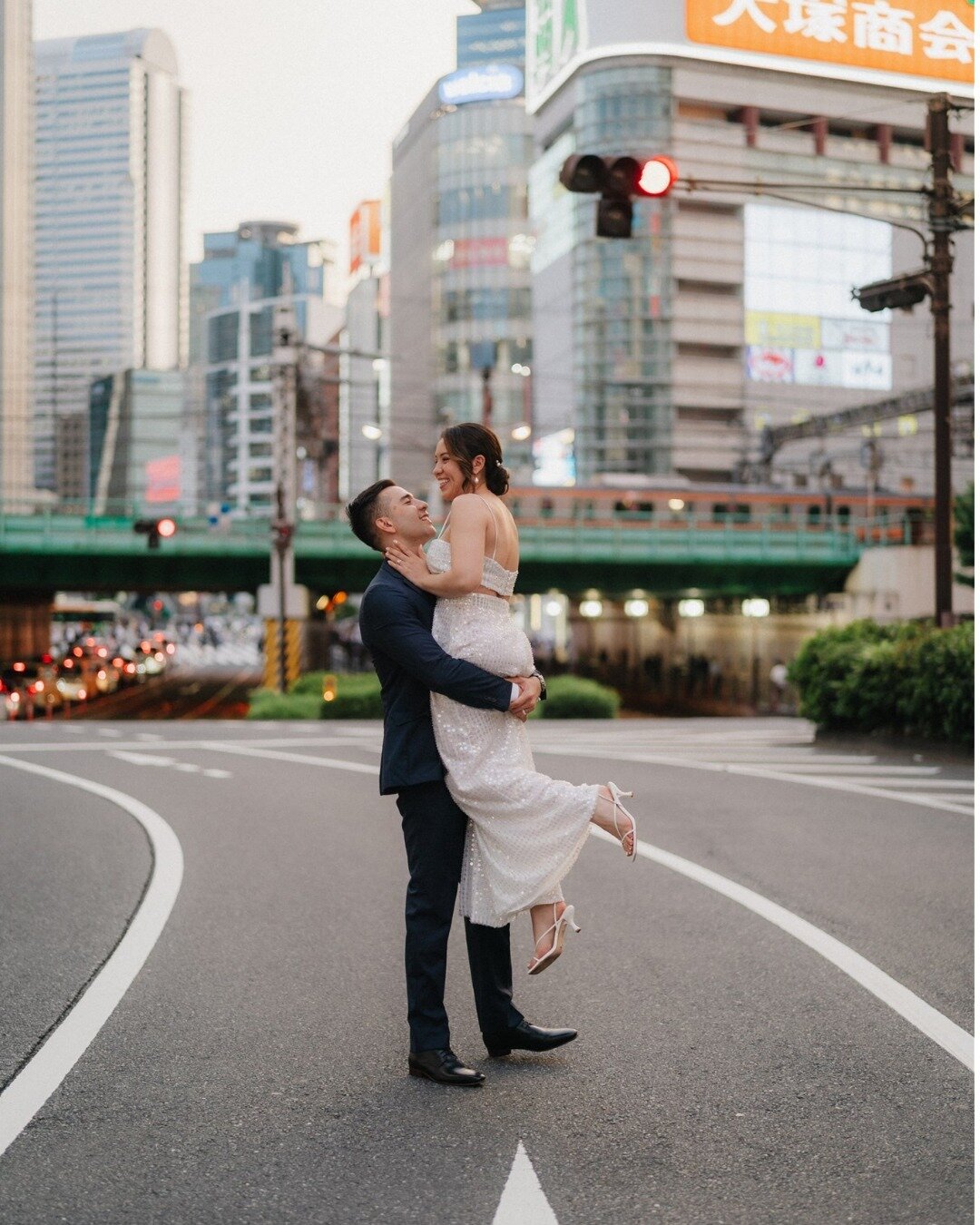 From serene gardens to vibrant city lights! ✨ - Part 2

M &amp; T's Tokyo wedding celebrations continued with stunning couple photos under the Tokyo skyline. The cityscape provided the perfect backdrop for their love story. Congratulations to this pe