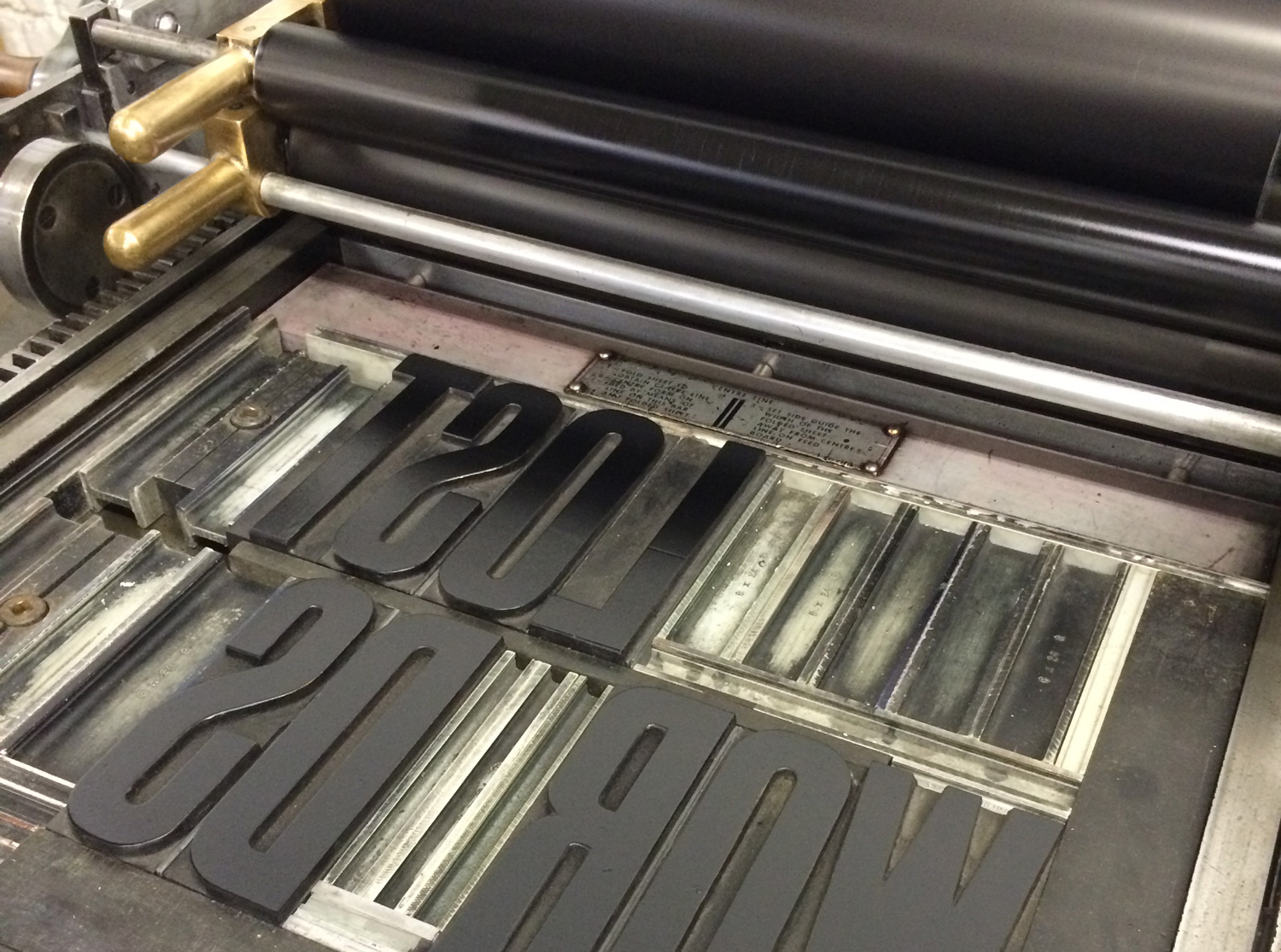 On press: woodtype on the Vandercook No. 4 