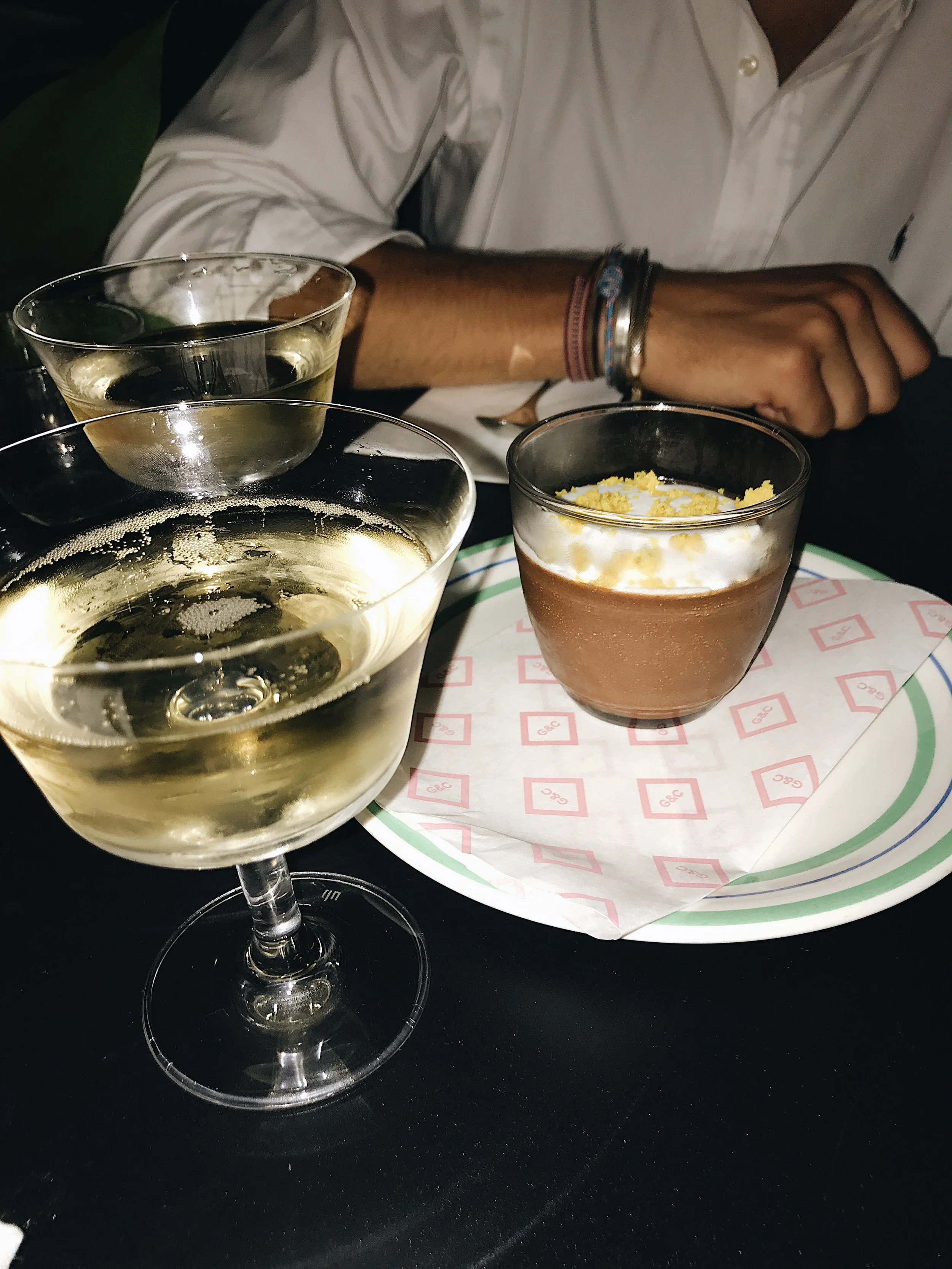 Champagne and Dairy-free cashew milk, date and cacoa pot, fresh turmeric crumb