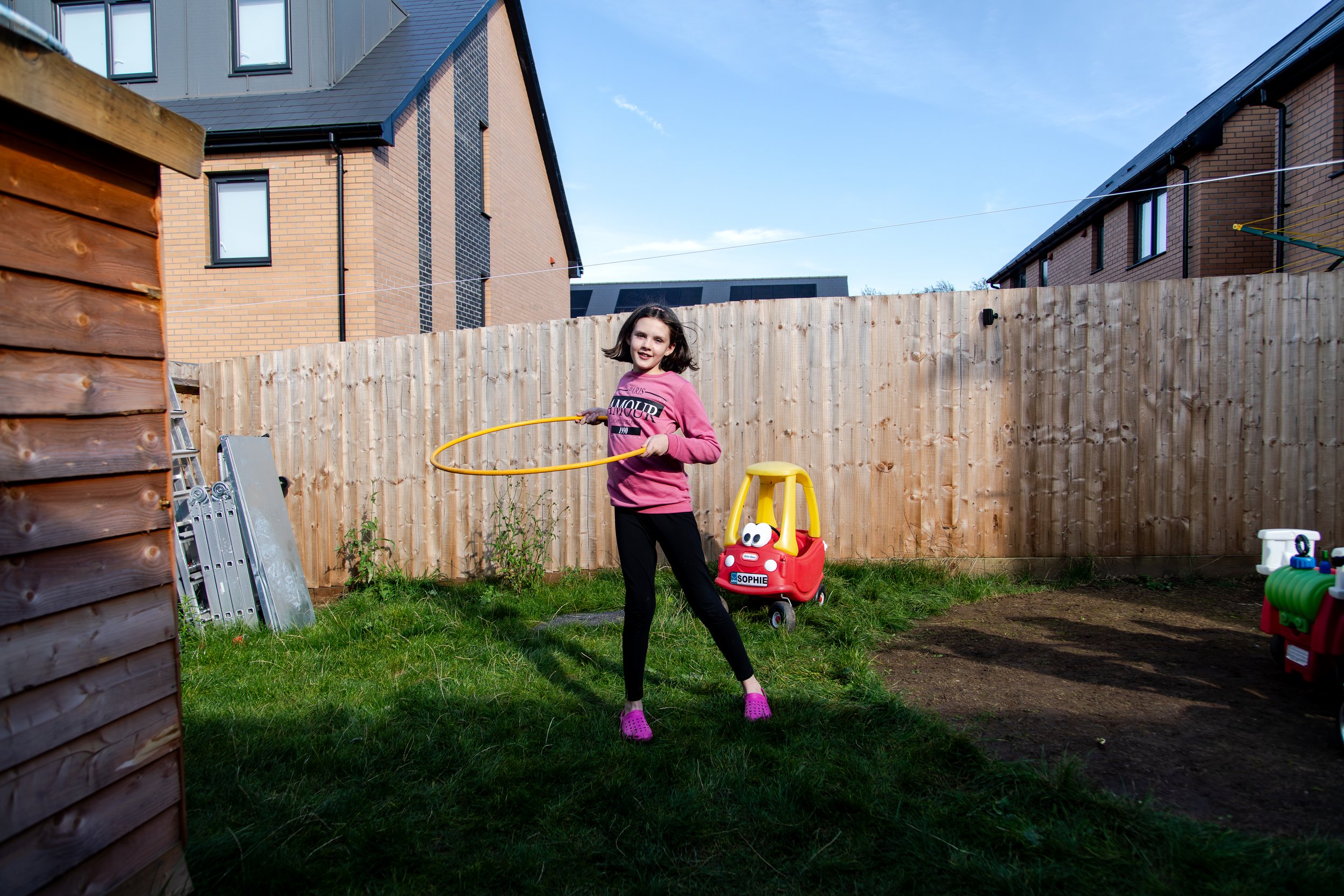 CH11166462_Sophie, nine, hula-s in her garden in Cardiff.jpg