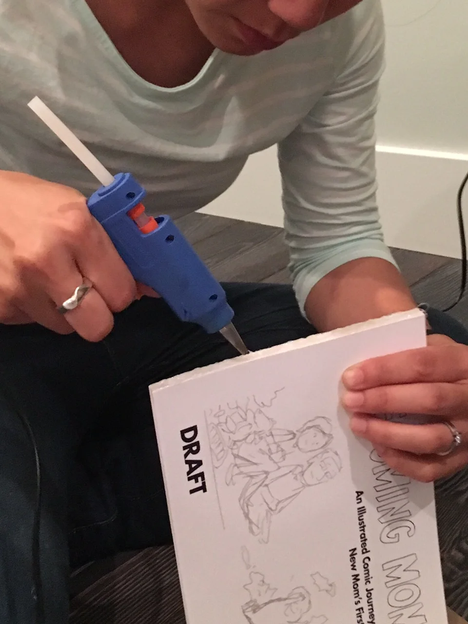 I used a glue gun to bind some early prototype copies of the book that I printed at Staples. 