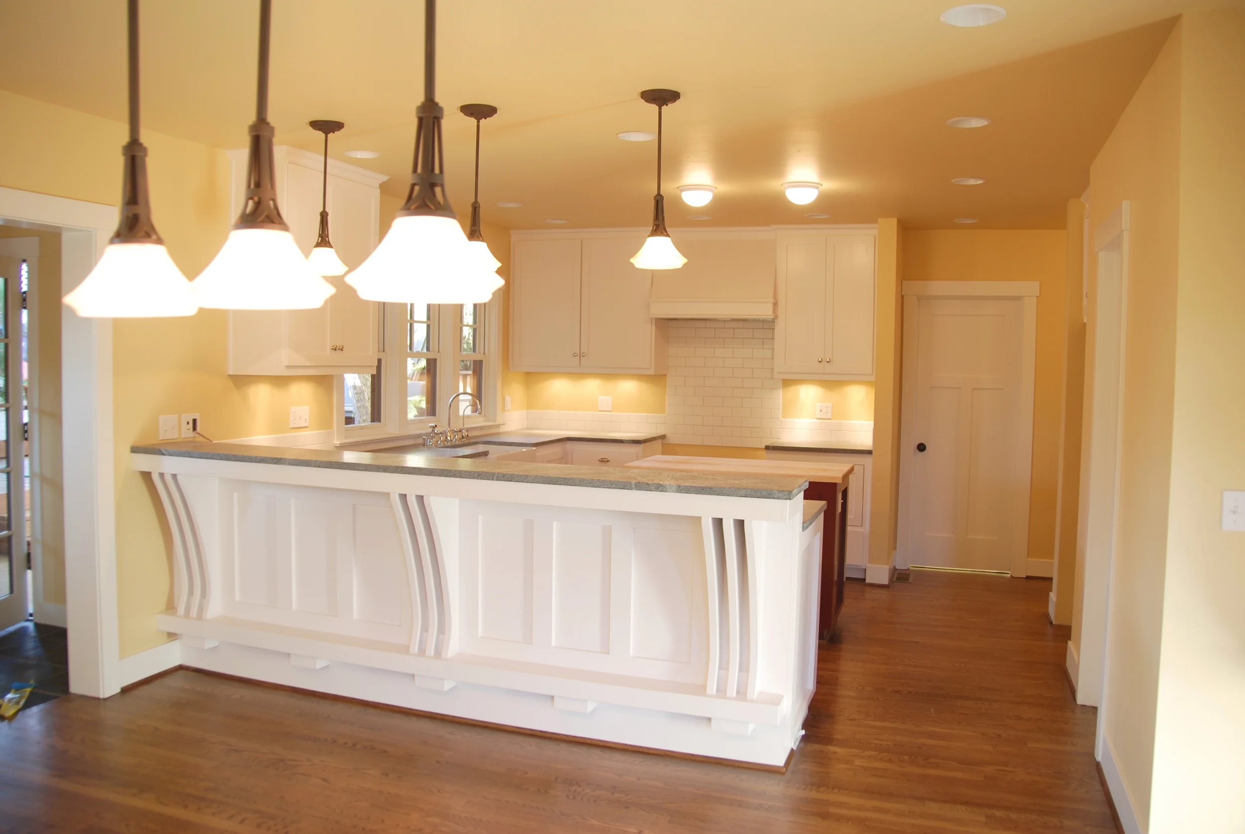 AFTER: New Kitchen is spacious and flows into the new Dining space beautifully