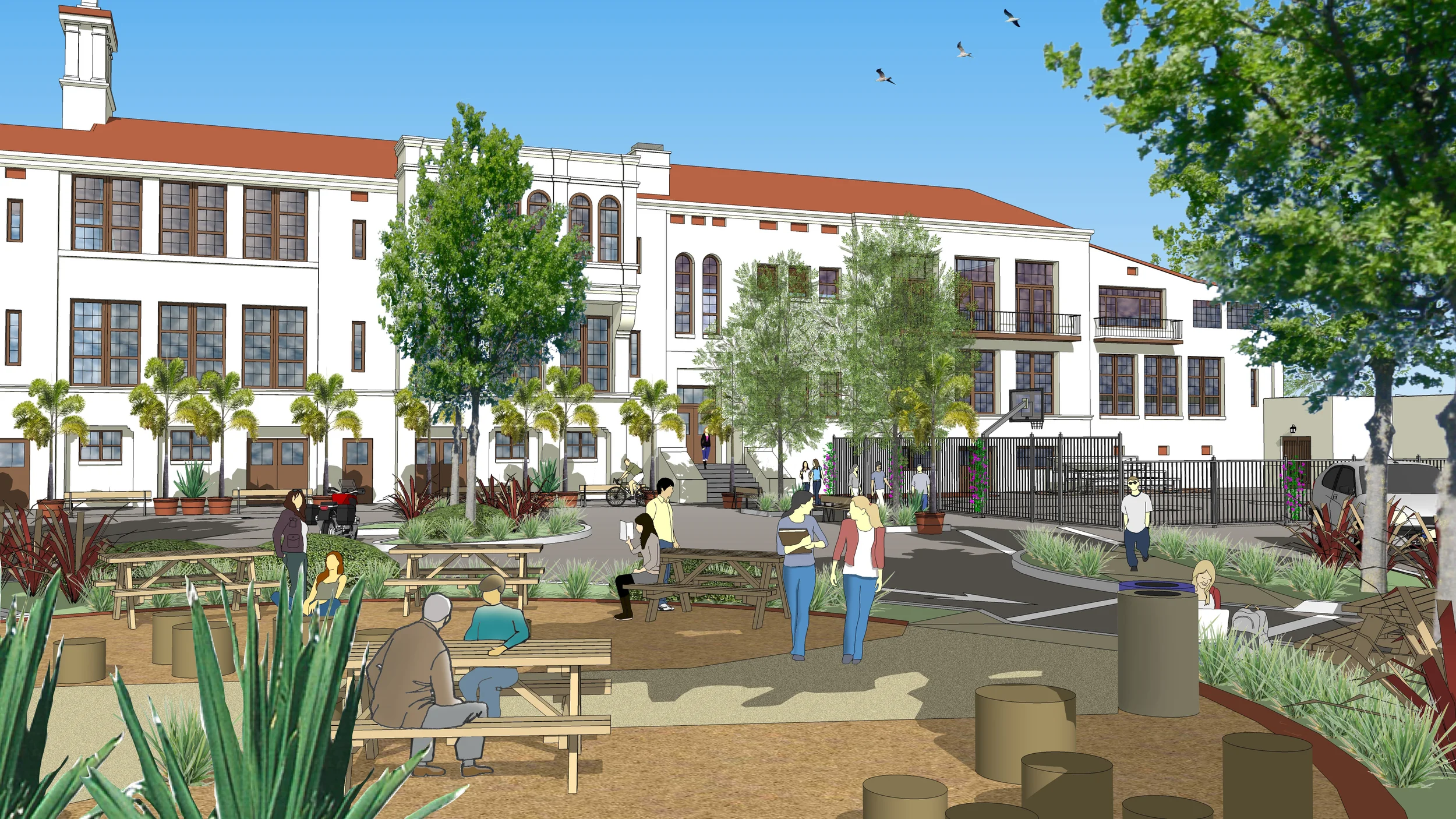 The main community space, carved out from former parking lot and underused landscape, now provides a safe gathering space for people to enjoy.