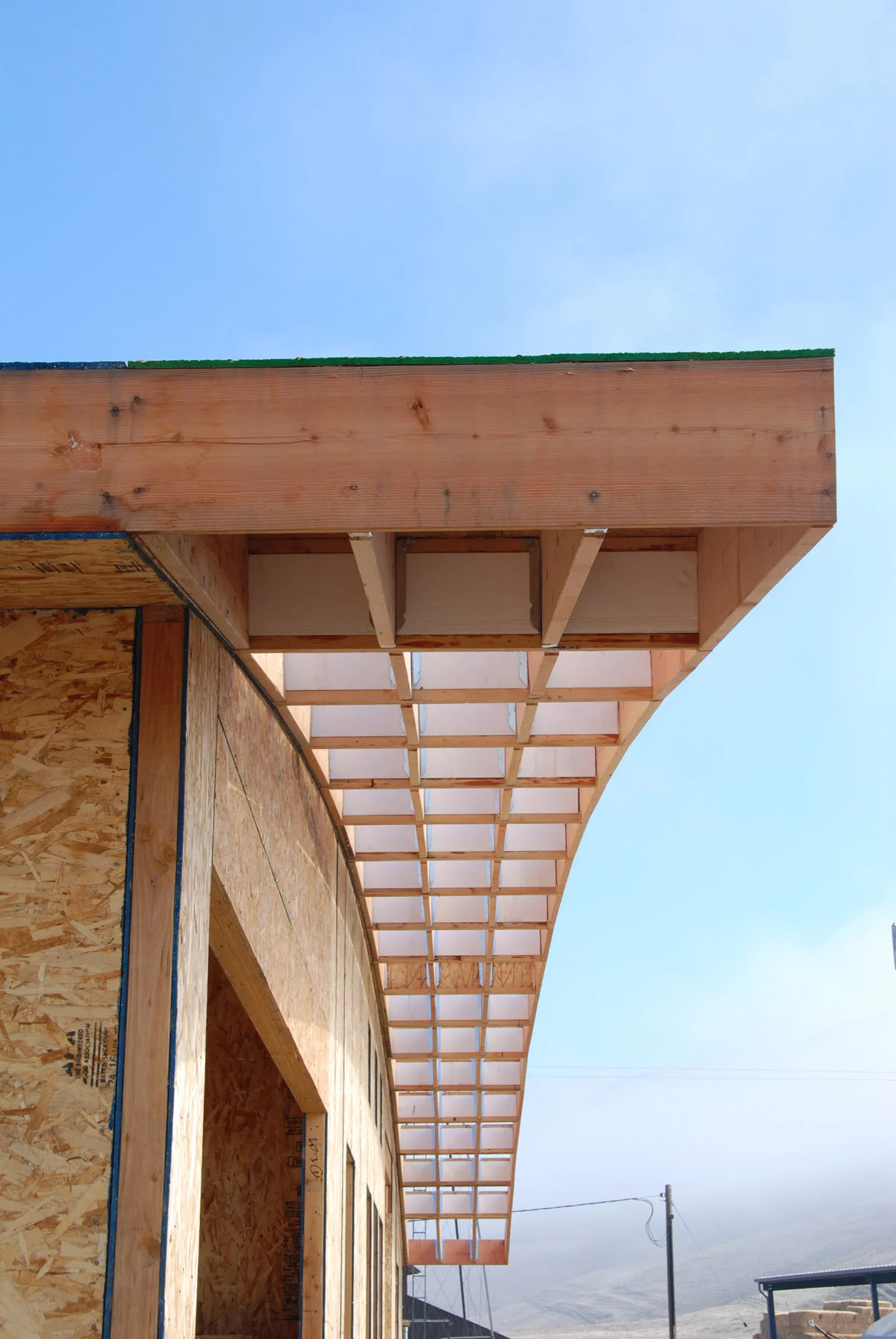 The only wood framing in the building - for a single deep overhang.