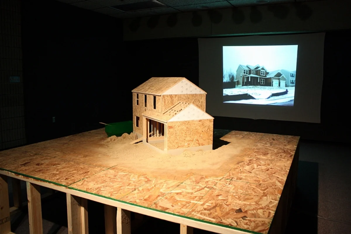 Alternate view of diorama with view of slide show of new construction homes