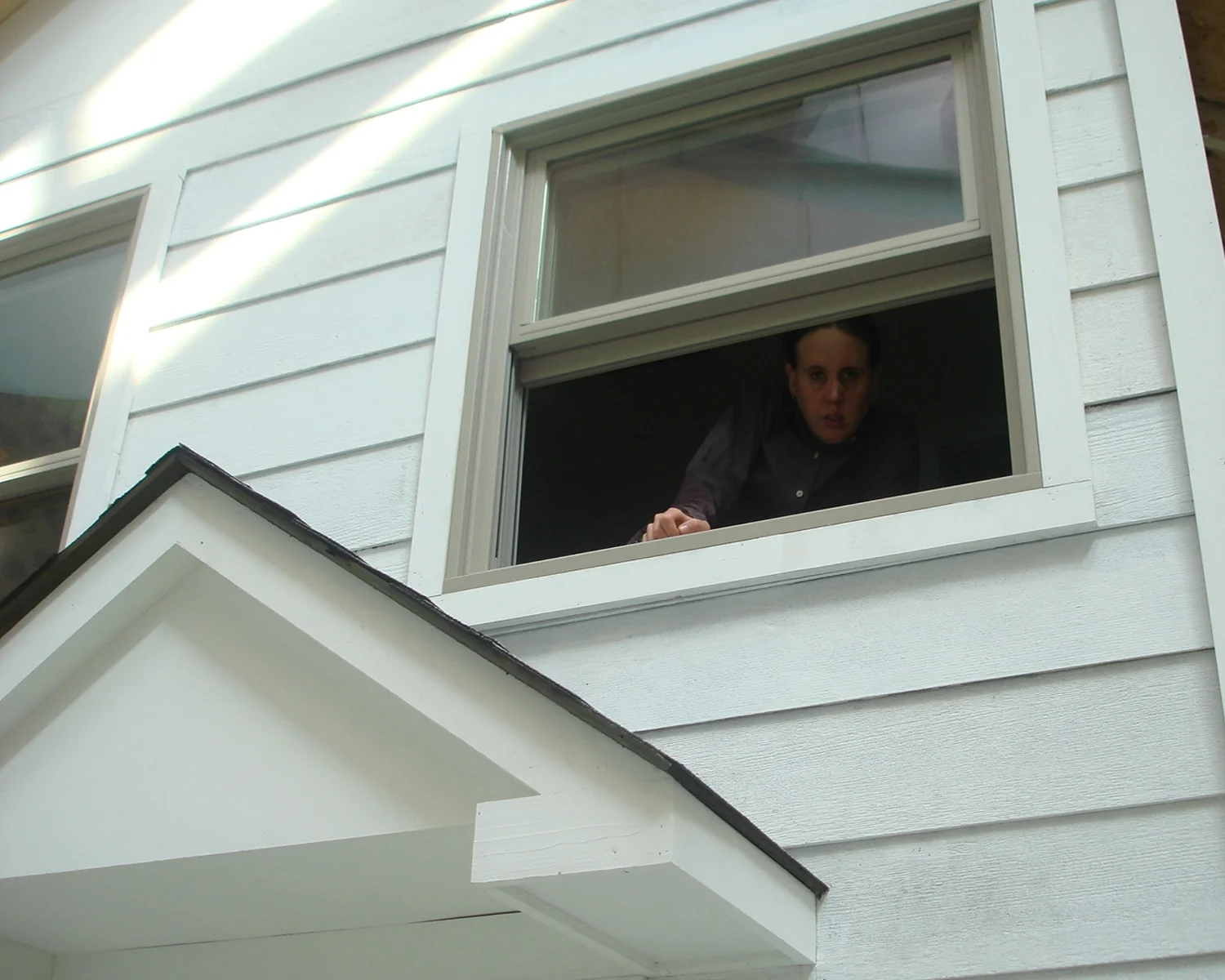 Visitor as seen through second story window