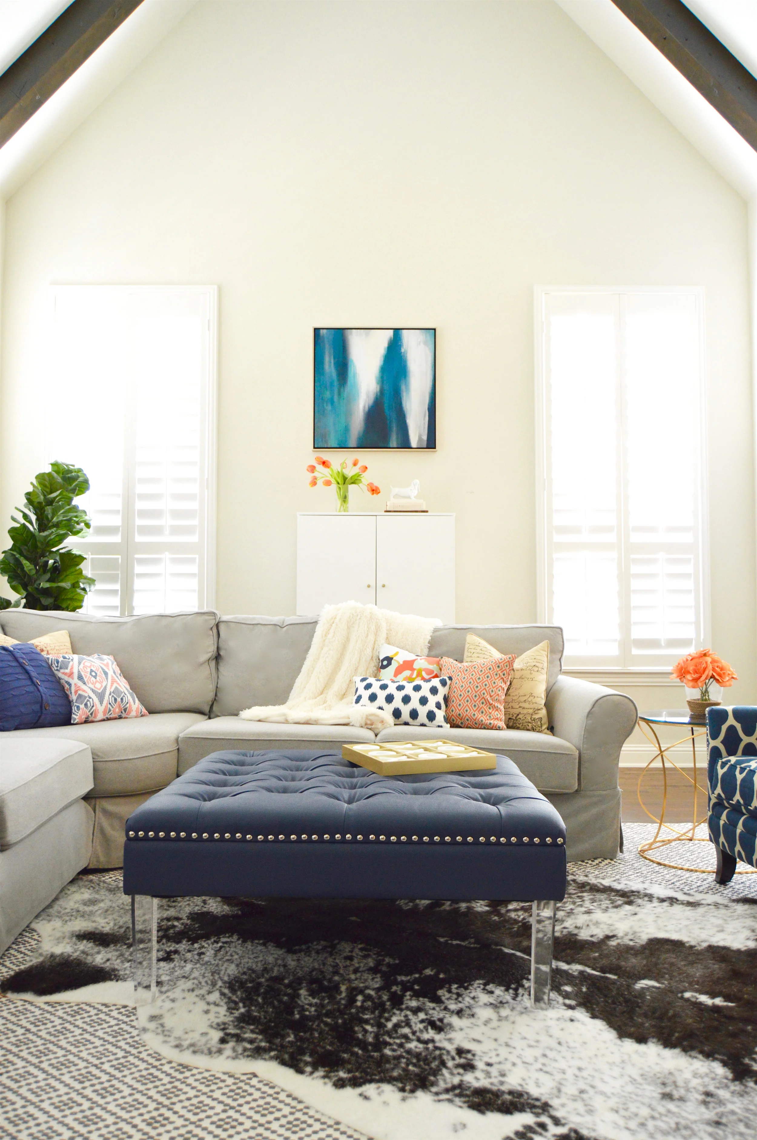 Bought this little blue abstract gem straight from ZGallerie the day before the install on this Frisco living room project .