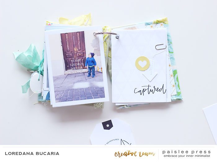 Piccoli abbellimenti qua e la, qualche cucitura, l'aggiunta di una tag e la storia mi sembra catturata a pennello anche se non scrivo ovunque!