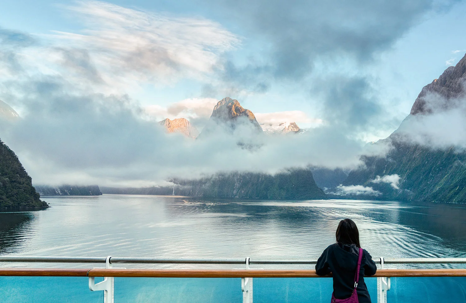 Thaneeya McArdle at Milford Sound, Fiordland National Park in New Zealand