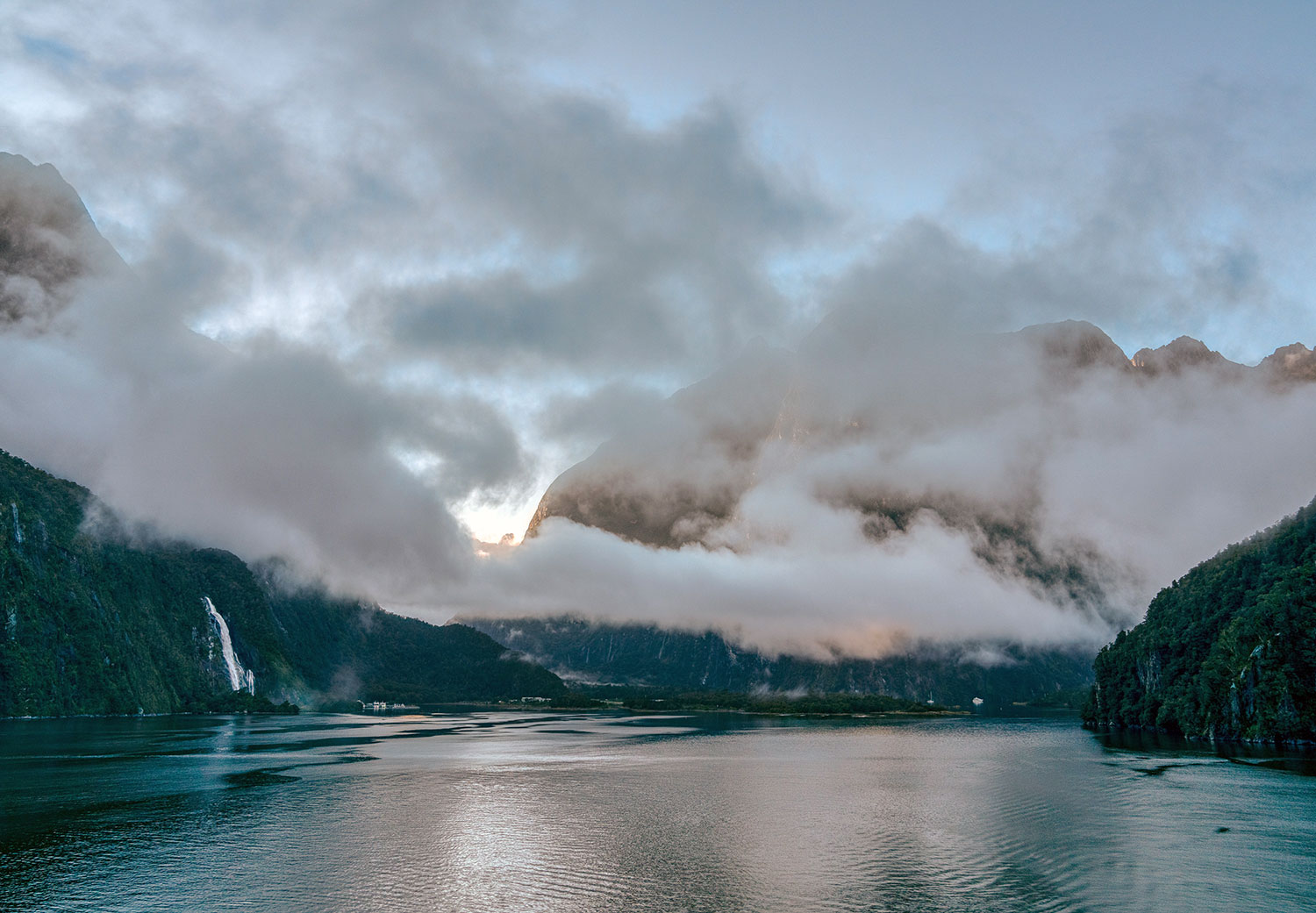 Low clouds at Milford Sound, Fiordland National Park in New Zealand