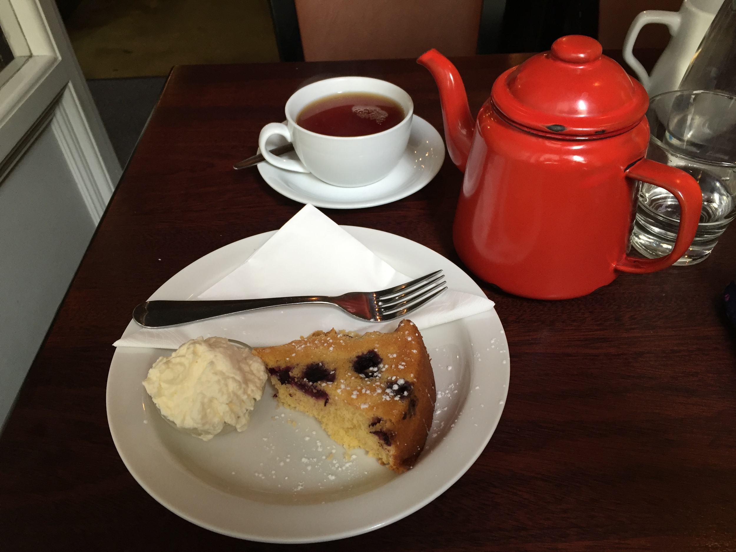 A GF lemon, polenta cake with blueberries.