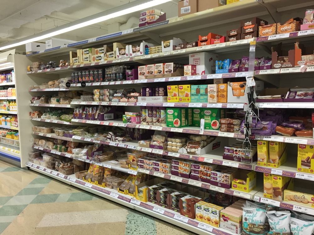 More GF options in this dedicated aisle at Tesco  than could fit in one picture and it was not the only section.