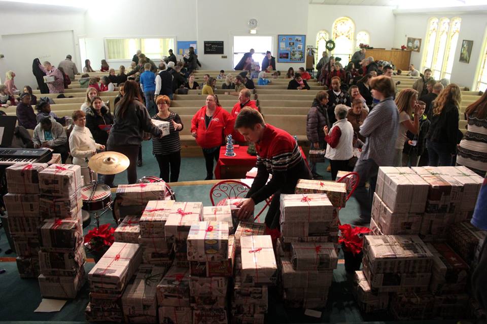 This was a picture of our community Christmas service last weekend. We gave away 115 Christmas presents to families from the community. Wow!