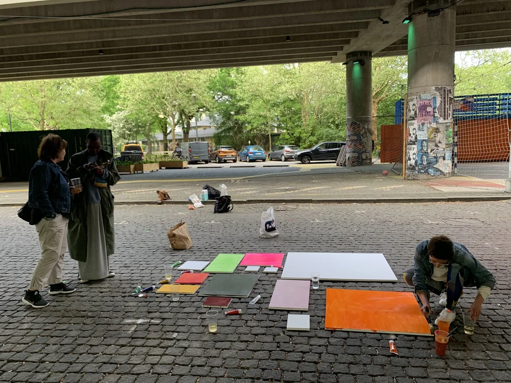  The first stage. We painted each blank canvas a solid color. Covering the canvas first allowed participants to be more free, letting go of the fear of starting from scratch. 