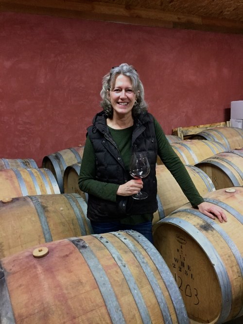 Laura Batistich, Emilio's wife and co-producer of their wines, in their straw-bale wine cellar located within 5 miles of Green Valley Vineyard.