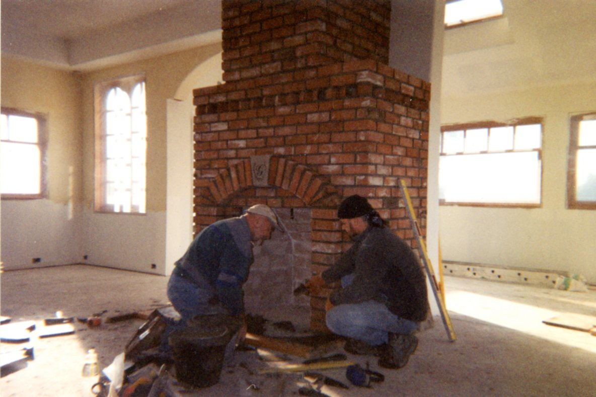 Laying the brick for the Rumford-style fireplace