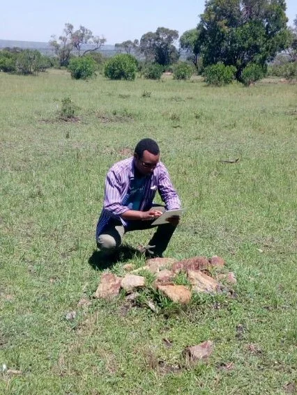 Jones Mwangangi working in the field, Mara north Conservancy