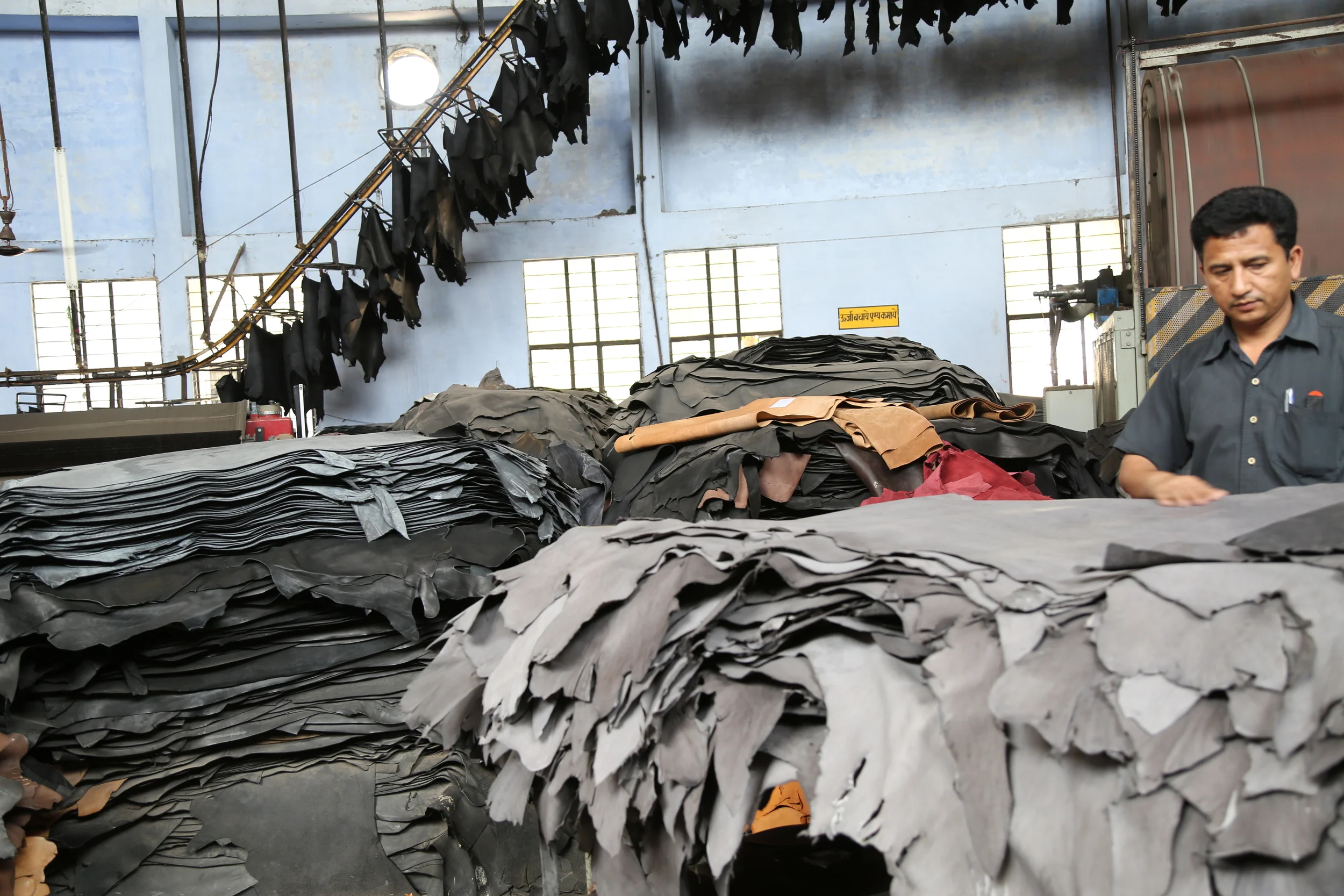 We have several members of the tannery checking the product during the tanning process to ensure quality.