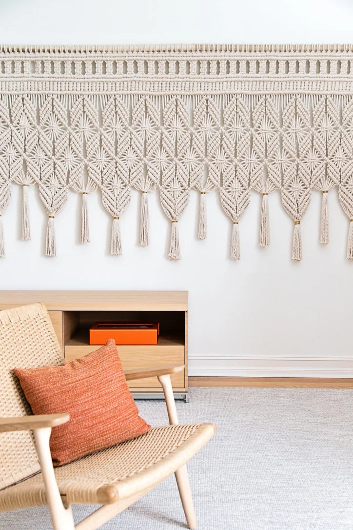 MODERN MACRAME WALL HANGING WITH BRASS MOUNTS AND TASSELS THIS DELICATELY KNOTTED DESIGN IS MADE FROM SOFT, NATURAL COTTON CORD AND FINISHED WITH GOLD WRAPPED TASSELS. PERFECT DIMENSIONS FOR OVER A BED OR A CREDENZA. DIMENSIONS: 9' WIDE, 4' HIGH FOR PRICING CLICK HERE , FOR CUSTOM ORDERS PLEASE USE THE CONTACT FORM. *PHOTO: GURUSURYA PHOTOGRAPHY , INTERIOR: ROOP RANG INTERIORS