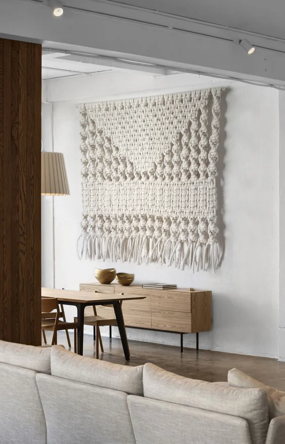 LARGE WHITE MACRAME WALL HANGING THIS SOUTHWESTERN INSPIRED DESIGN MIXES DIMENSIONAL KNOTS AND NATUAL FIBERS FOR A PIECE THAT FEELS RELAXED CONTEMPORARY. FOR PRICING INFORMATION CLICK HERE . FOR CUSTOM SIZES OR TO PLACE AN ORDER PLEASE USE THE CONTACT FORM.