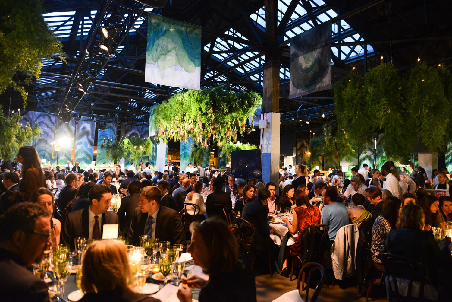 VAN WYCK Hanging greens and panels of dip dyed fabric hand overhead guests at the annual Edible Schoolyard NYC benefit gala.