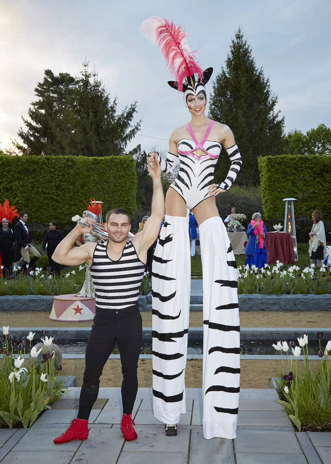 VAN WYCK A stilt walker and friend welcome guests to a circus themed birthday bash.