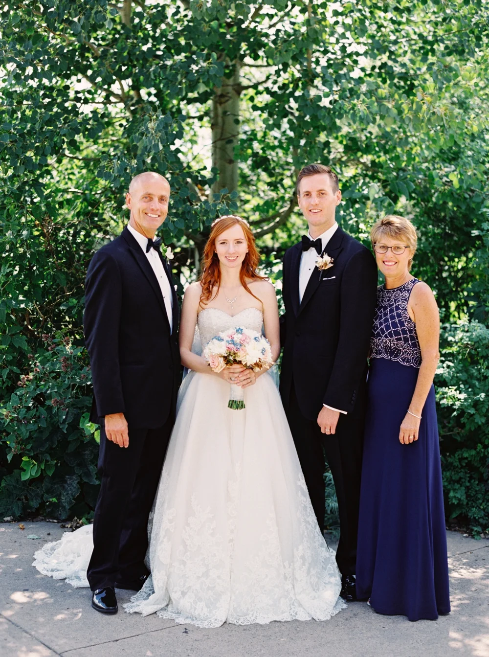 Calgary Wedding Photographer | Canmore Wedding Photographers | Banff Wedding Photography | Fairmont Palliser | Calgary Church | Blue bridesmaids