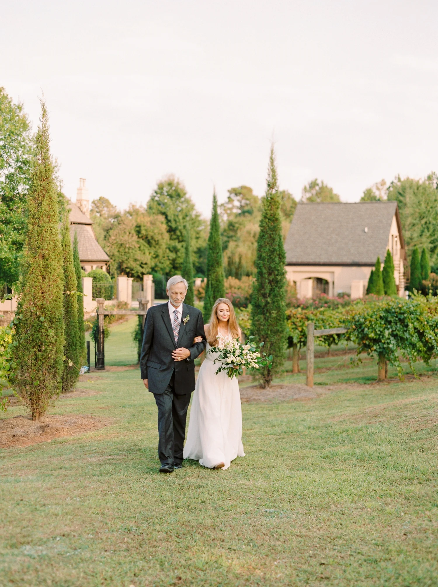 Calgary wedding photographers | georgia wedding photographers | fine art film | Justine Milton Photography | georgia wedding | bride and groom portraits | walking down the aisle | father and bride
