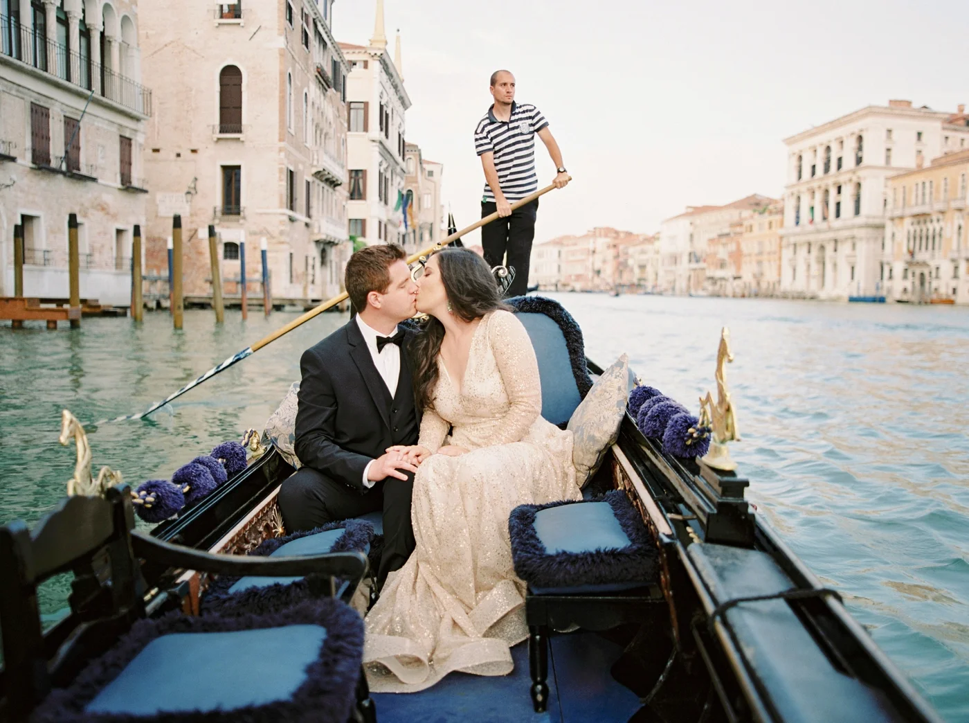 Venice italy wedding photographers | long sleeve wedding dress | italy vow renewal | justine milton fine art film photographer | bride and groom portraits in a gondola