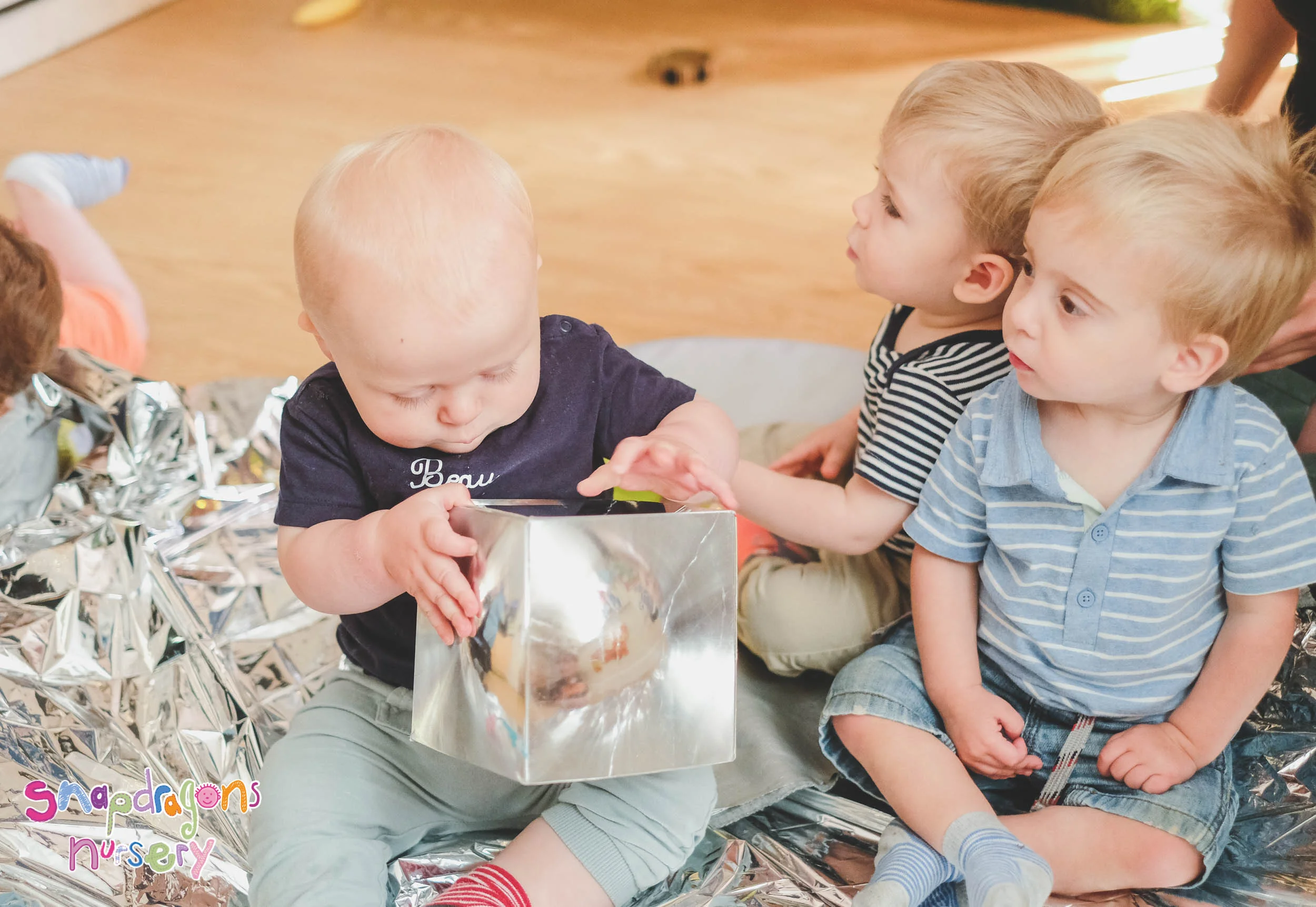 Babies - Exploring light and reflective surfaces