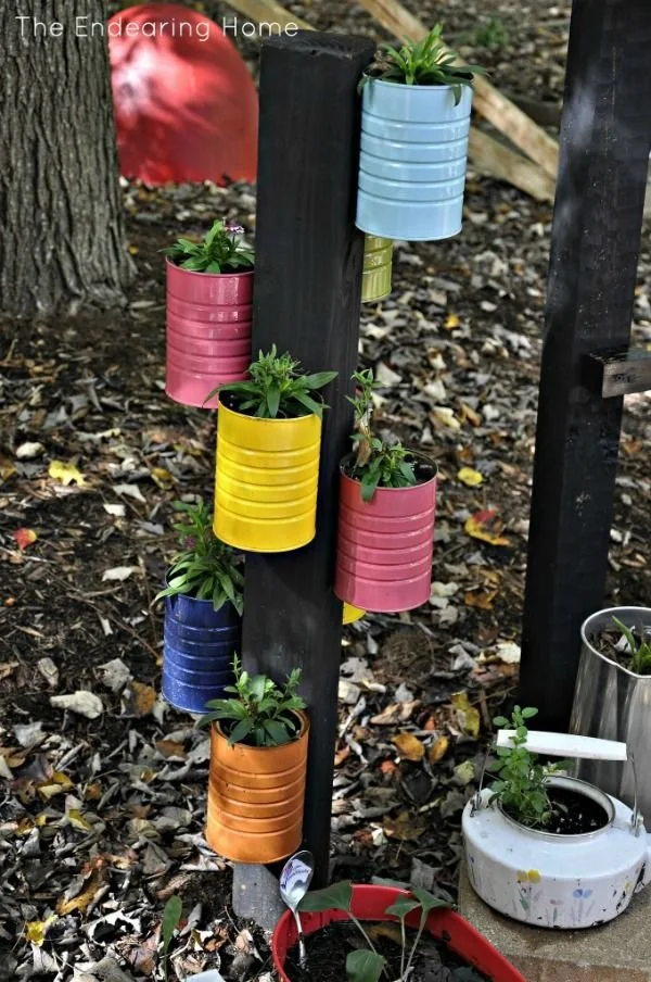 f172b145eab157a8a30949e95d387e98--tin-can-crafts-flower-pots.jpeg