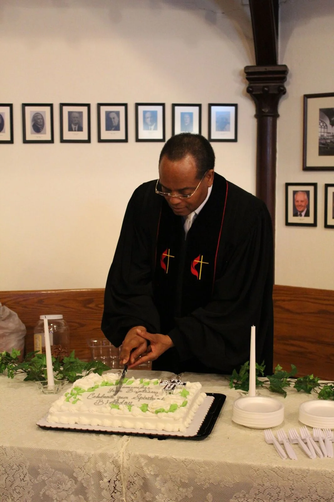 Cutting baptism cake.jpeg