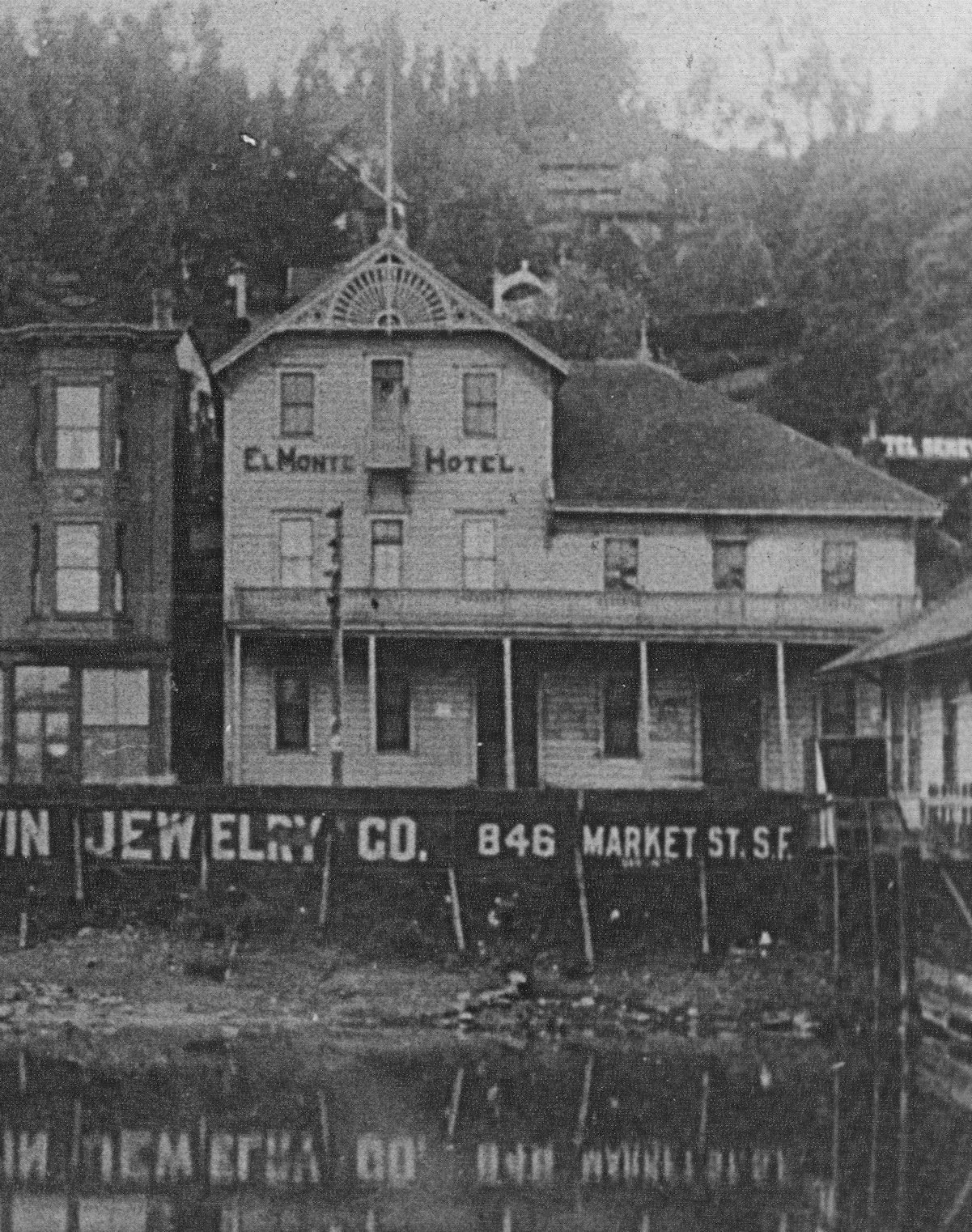 The El Monte Hotel, c. 1897, above the “Pond,” which is now Vina del Mar Plaza. An advertisement for Baldwin Jewelry in San Francisco hangs below street level 