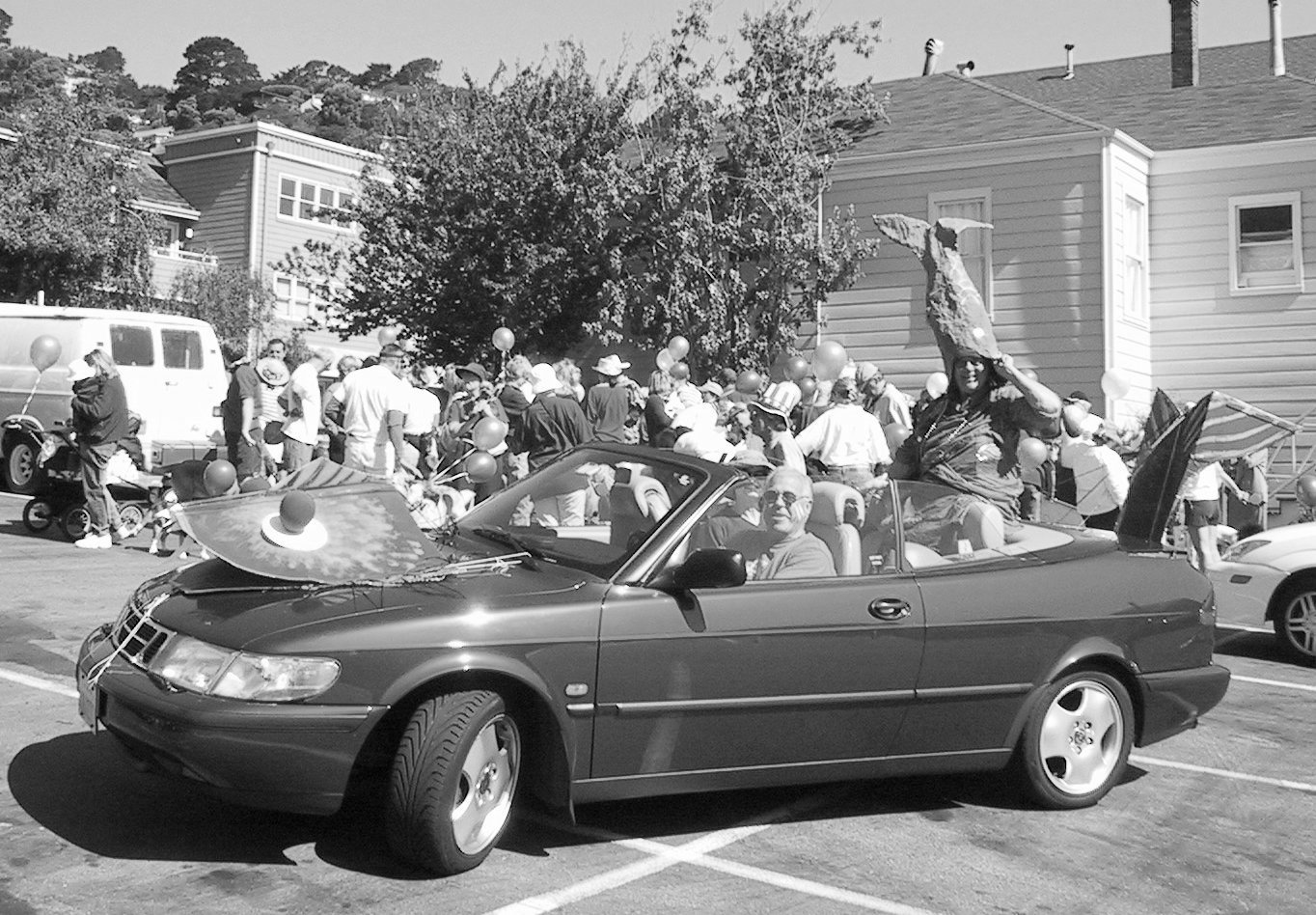 Cornell Ross and Pam Bousquet chauffeured parade F(l)ounder Laurabell Hawbecker in the 2002 parade. Photo: Larry Clinton