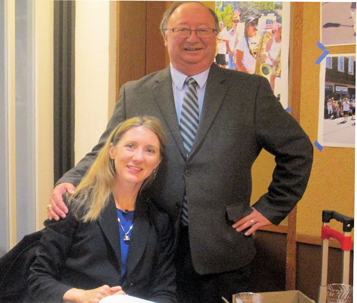 SHS President Jerry Taylor greets author Laura Ackley atCampbell Hall. Photo by Steefenie Wicks