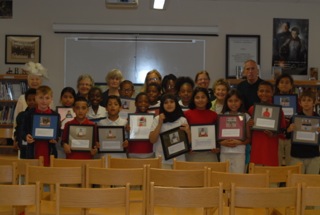 Bayside Academy librarian Fran Nelson, third grade teacher Jim Scullion, and Principal Jonette Newton are joined by Sausalito Historical Society docents Vicki Nichols, Nancy Osborn, Jeanne Fidler, Margaret Badger and Susan Frank after attending the end-of-year award ceremony for the students. Docents not pictured are Dana Whitson and Jerry Taylor.