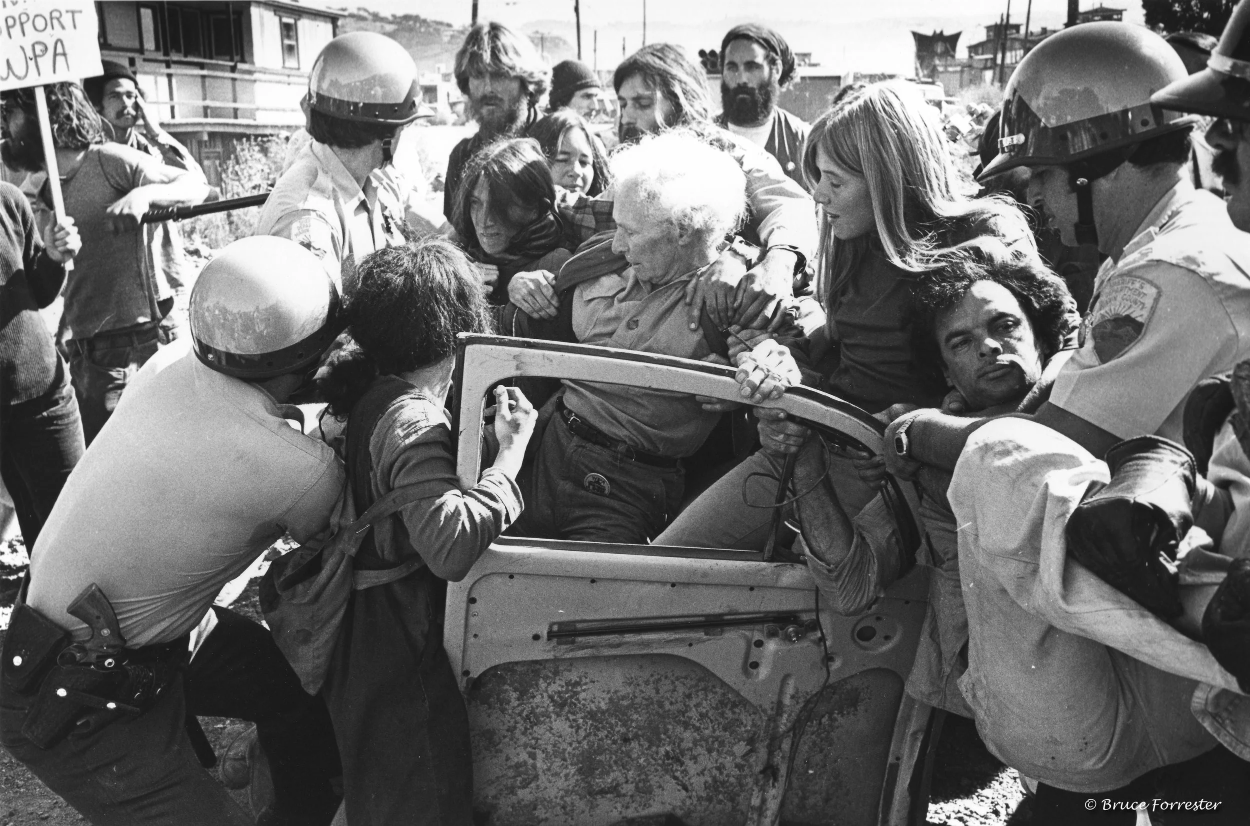 Piro being manhandled by sheriff’s deputies (© Bruce Forrester)