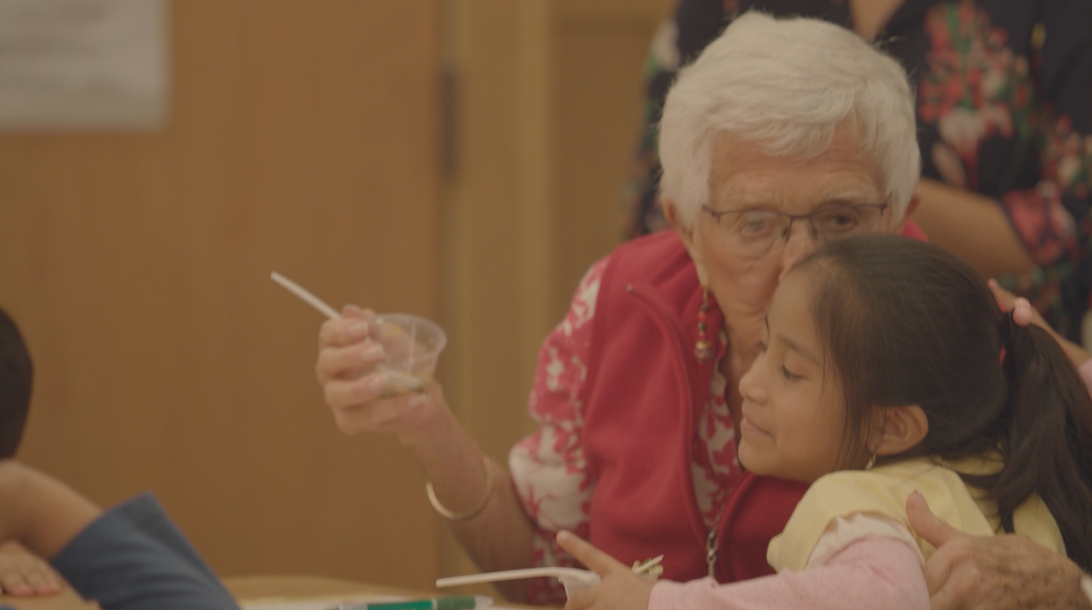 children cooking with seniors