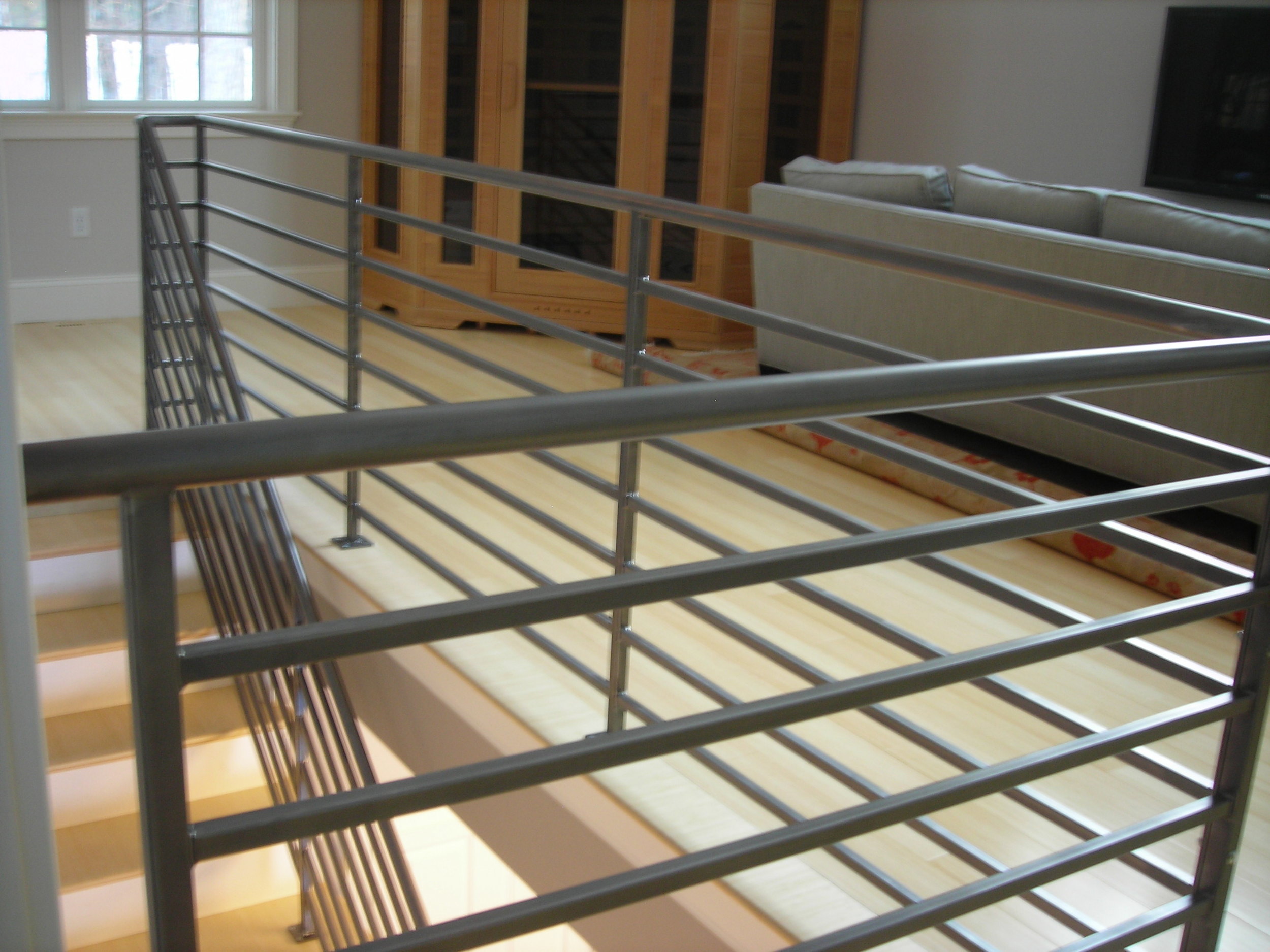 Steel Horizontal Bar Interior Rail. Brush Finish topped with Clear-Coat Finish.