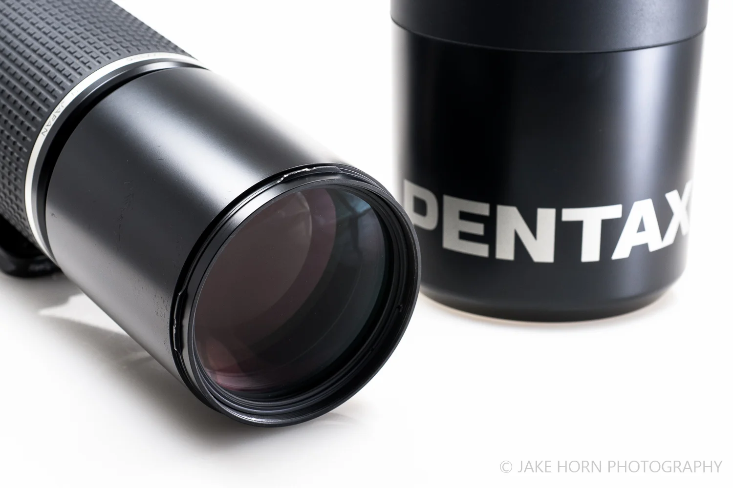 Accepts 77mm Filters and Burly Lens Hood
