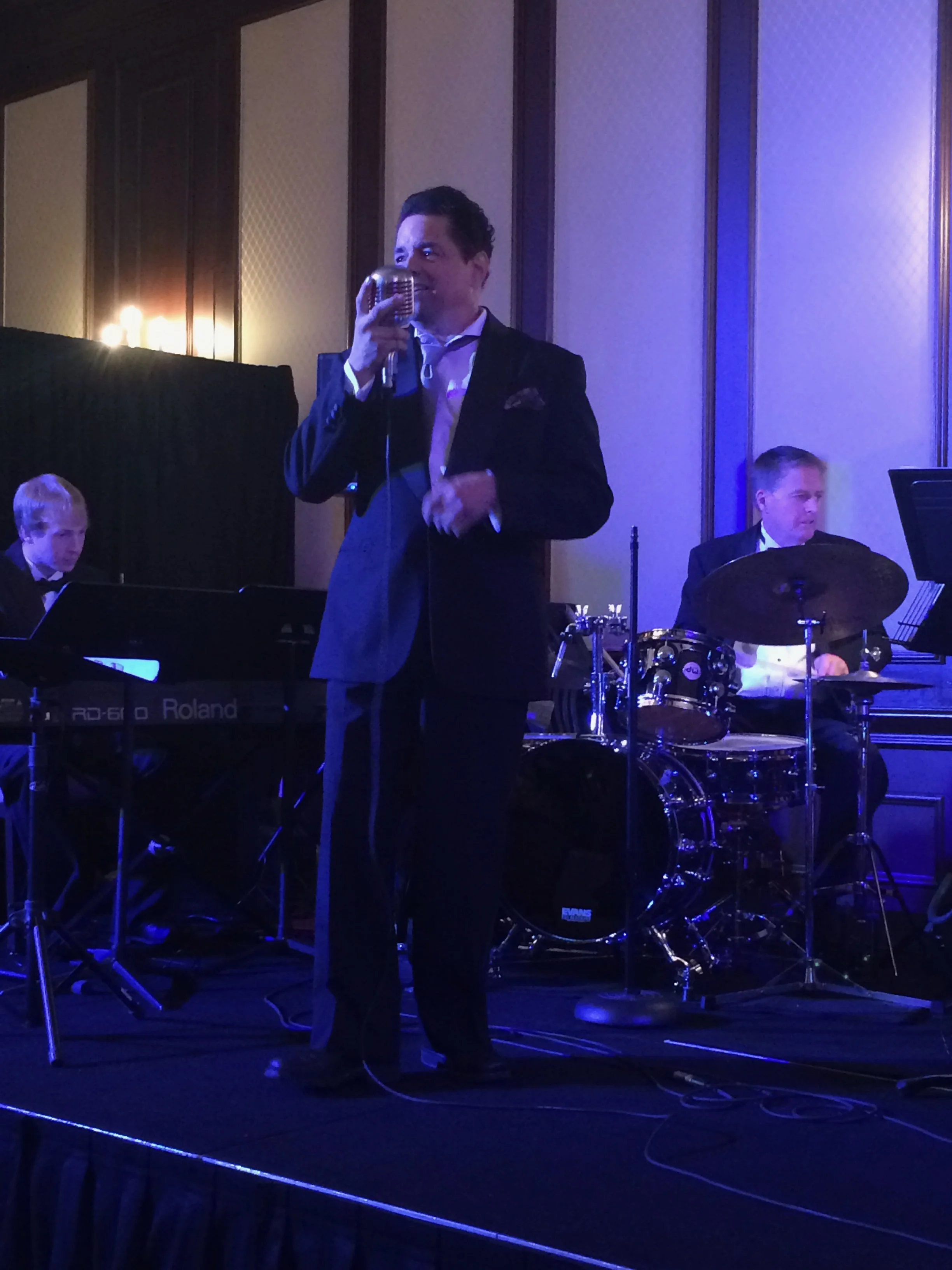 10-piece band performing during candlelight on Monday night