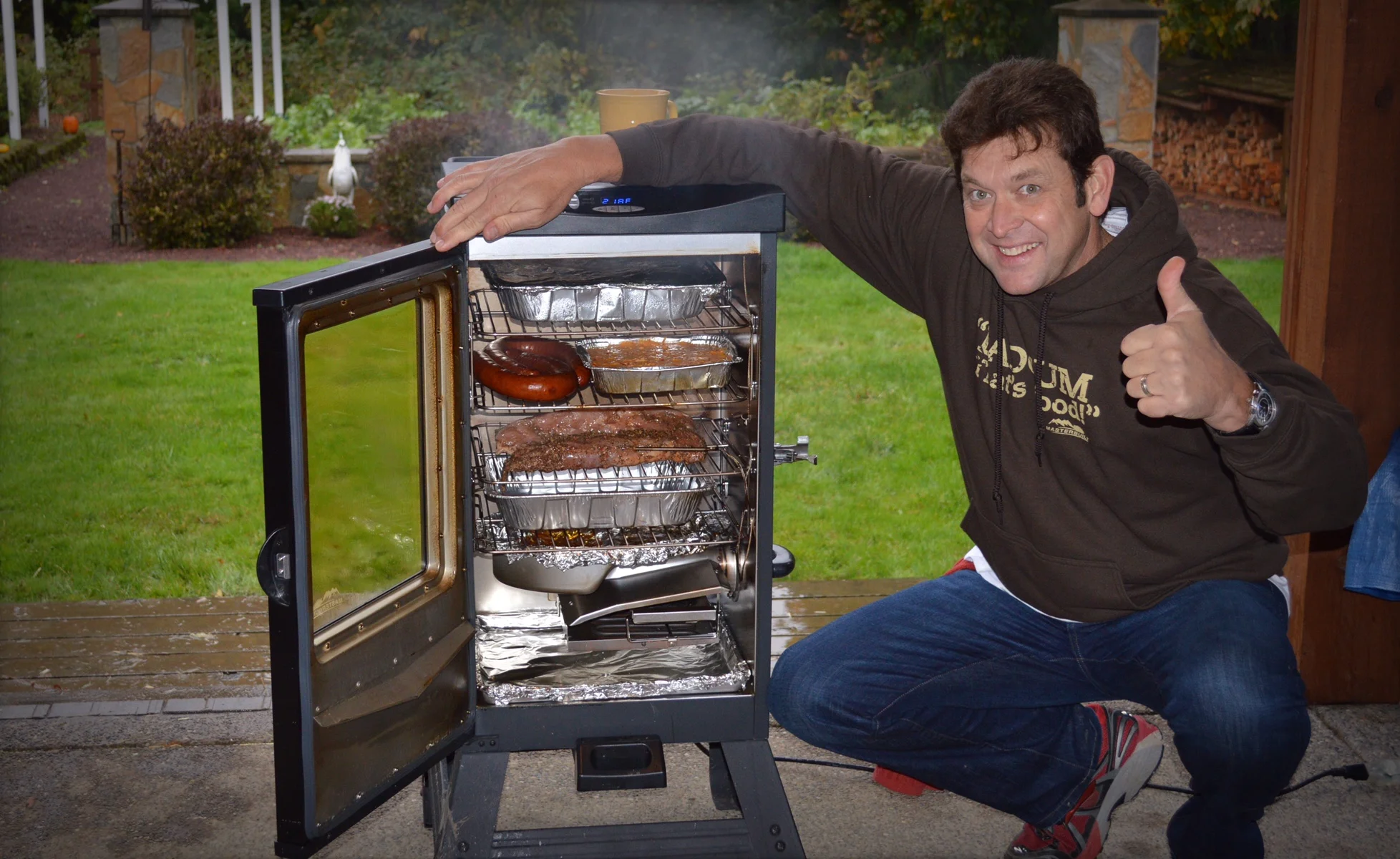 John shows off the Smoker full of smokey goodness!