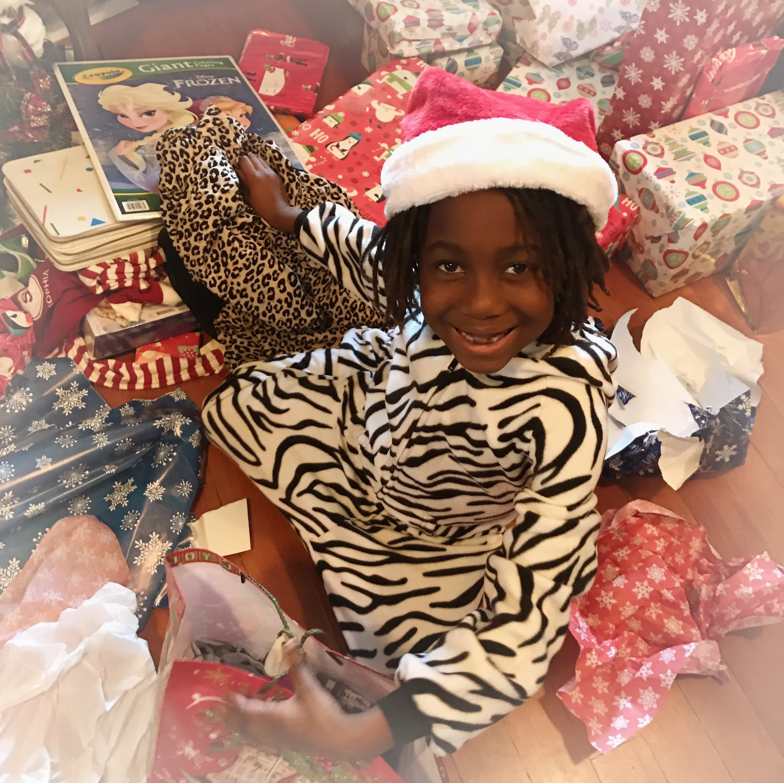 "Junior" as she now insists on being called, reveling in the glory of Christmas gifts!